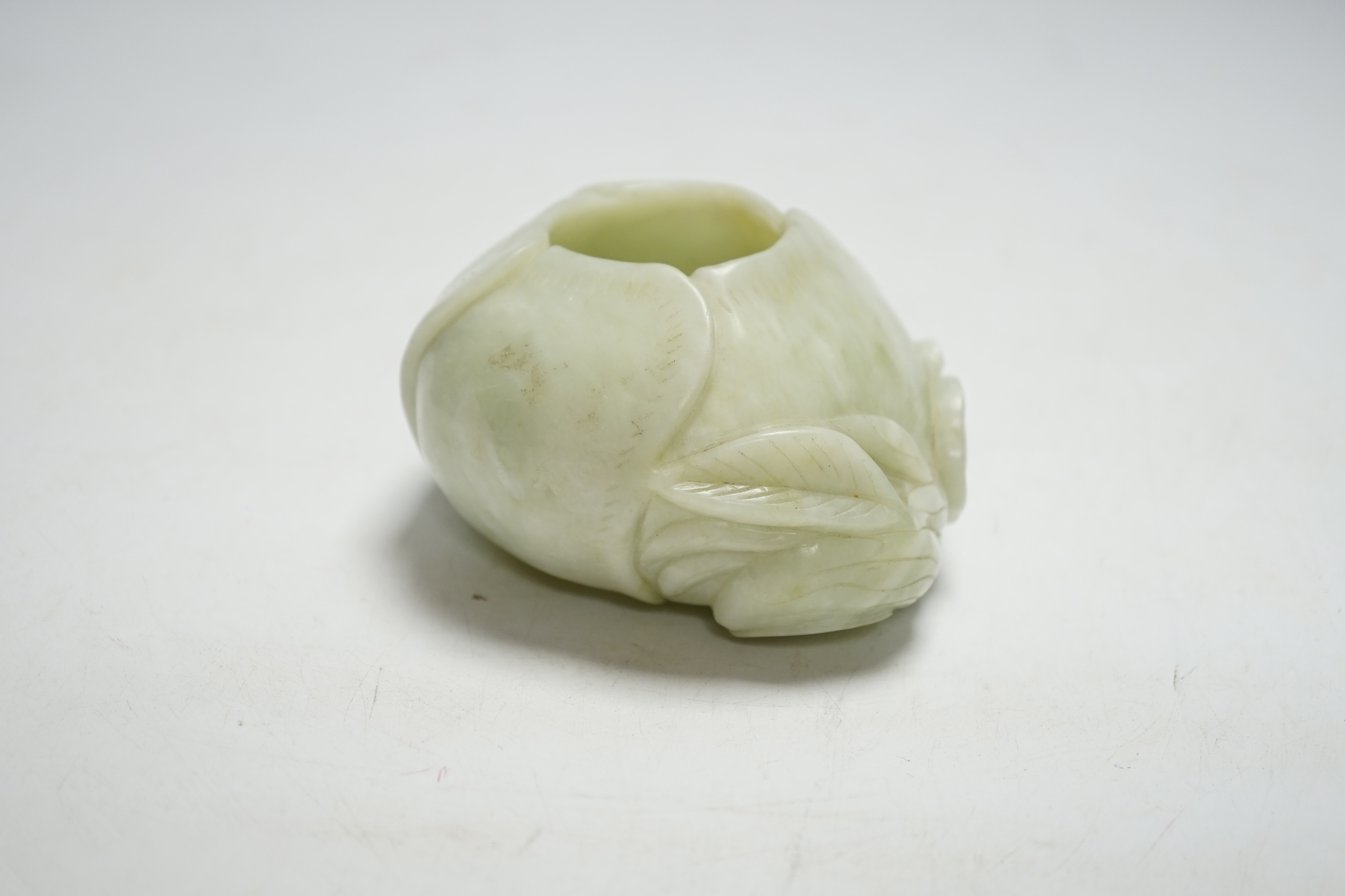 A Chinese bowenite jade water pot, 10.3 cm